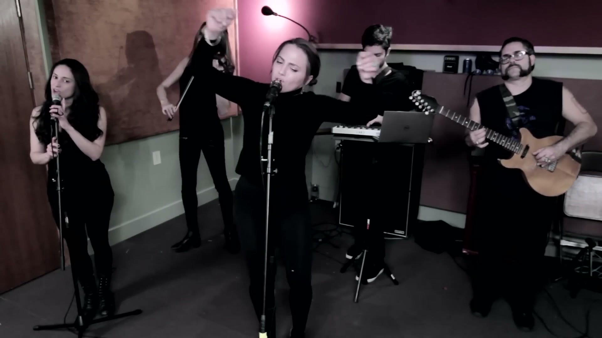 Alexis Moraites singing with the band, live session